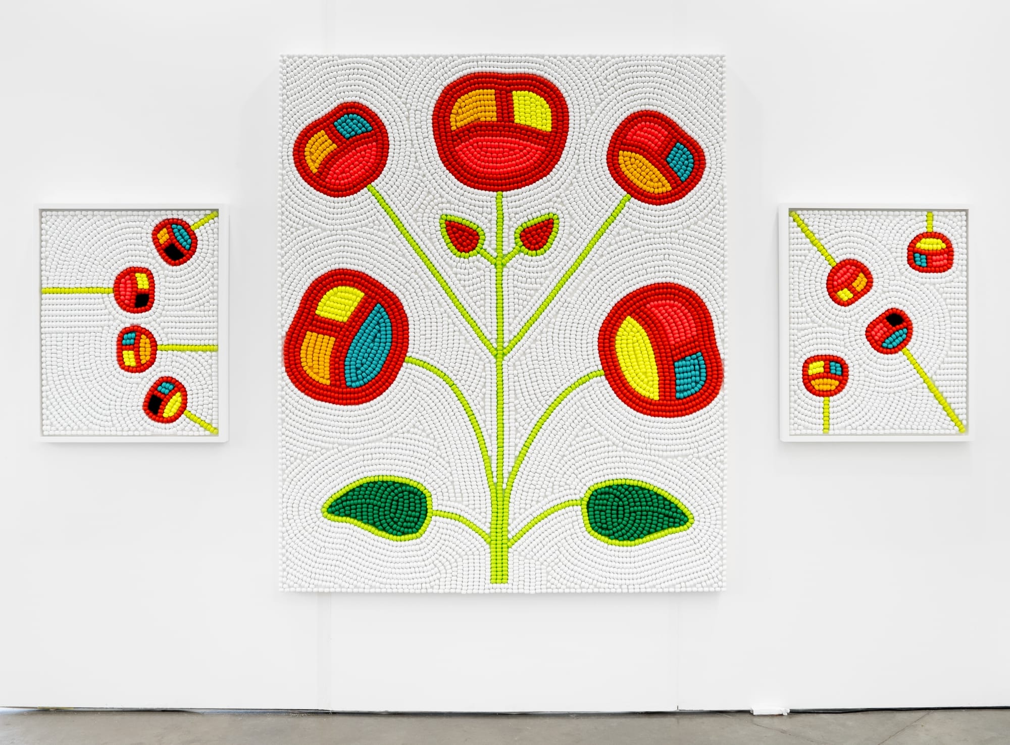 a beaded triptych by Renee Condo of cherries on white