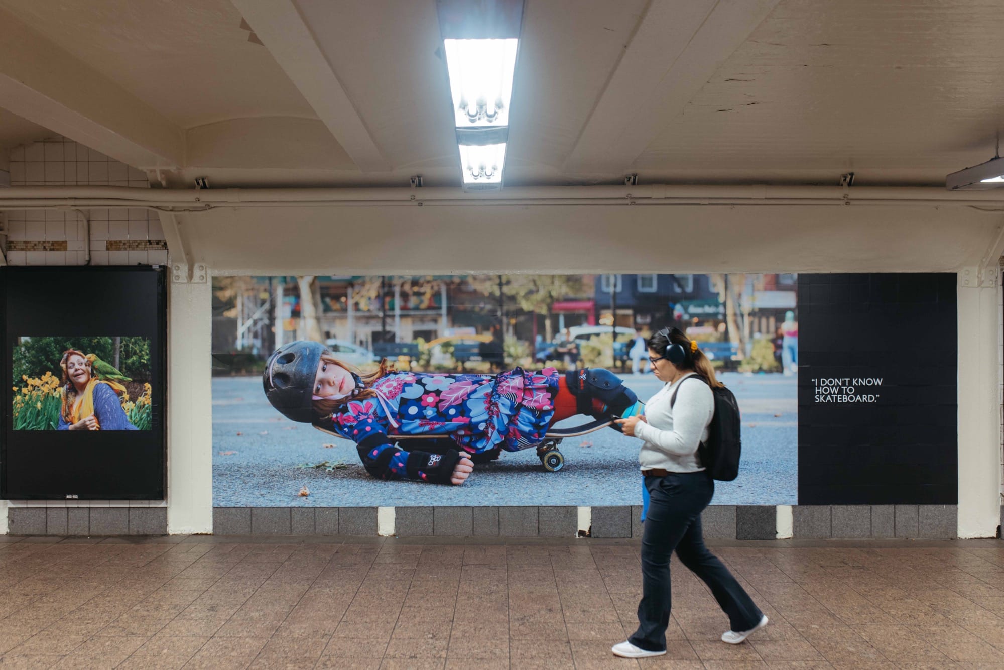 a photo installation of Brandon Stanton's Dear New York in the subway