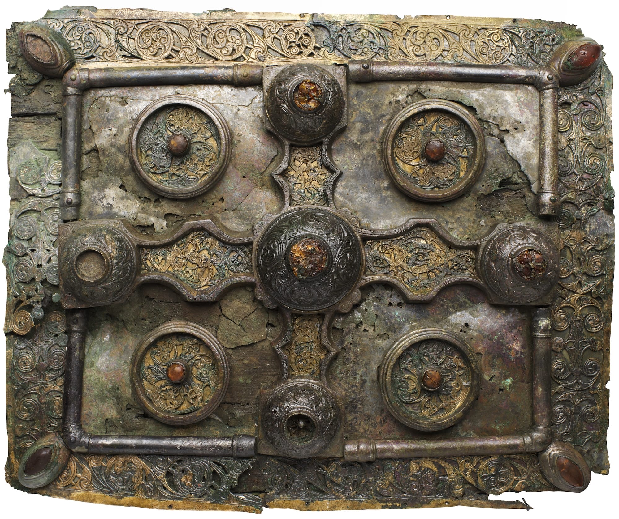 a highly decorated medieval metal book shrine