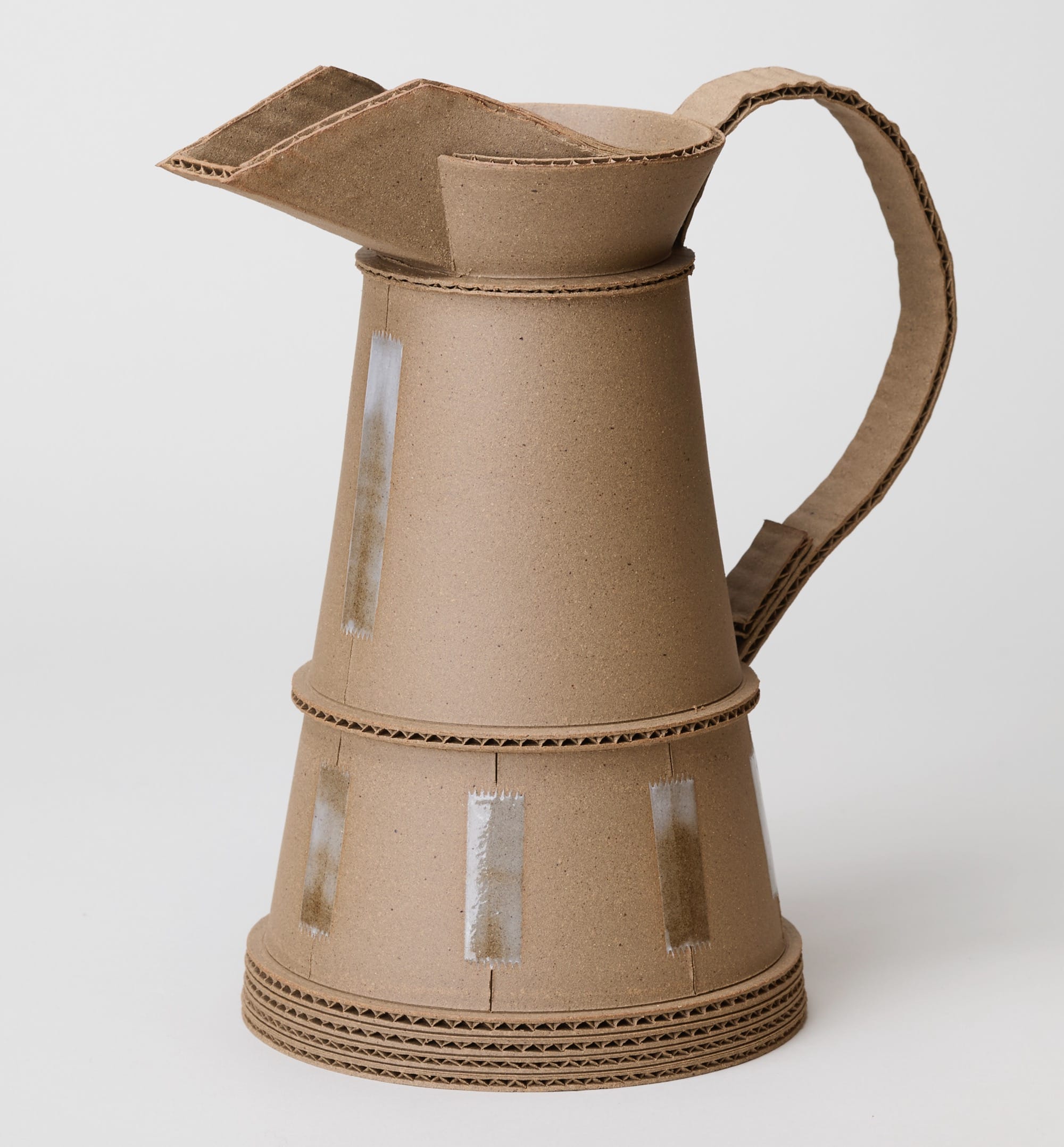 a ceramic pitcher by Jacques Monneraud that resembles cardboard with tape